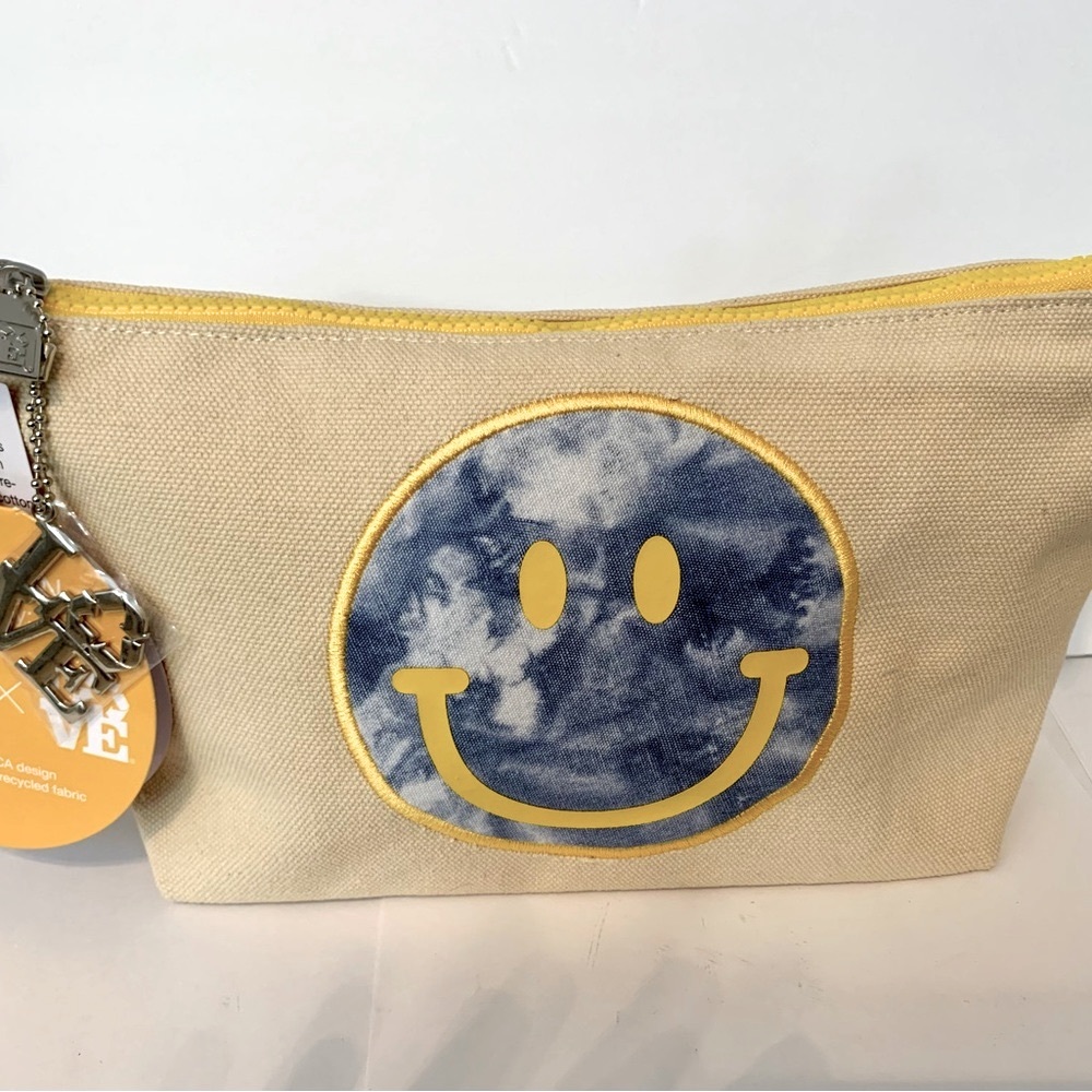 NWT. canvas makeup bag or clutch with smiley face